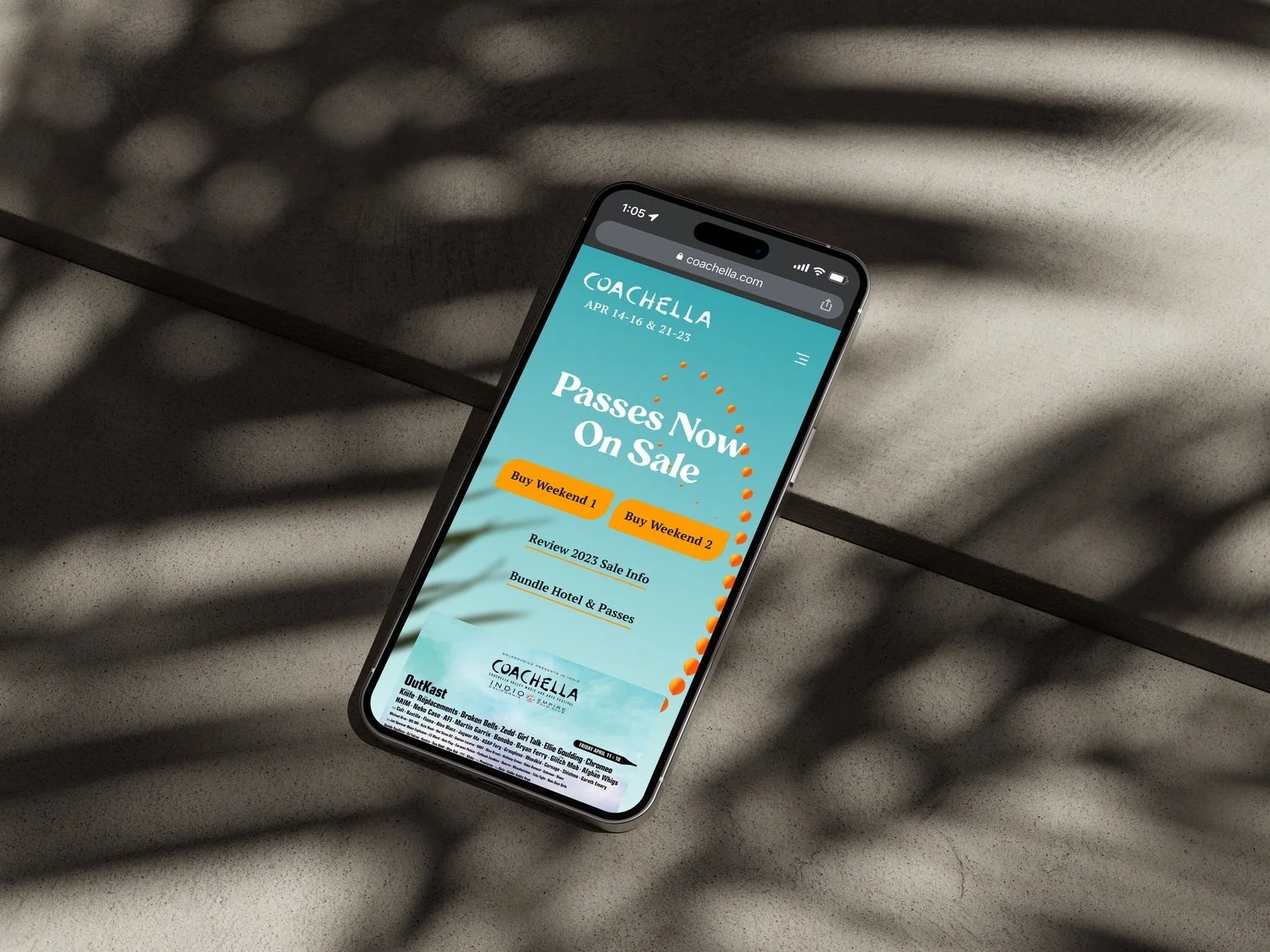 iPhone showing Coachella homepage with Passes Now On Sale hero, weekend CTAs, and palm frond shadows
